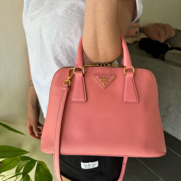 Prada Handbags - Prada pink saffiano mini dome bag